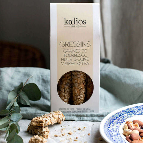 Gressins (Graines de tournesol) Breadsticks of the Kalios brand, stored in their cardboard boxes, front view.