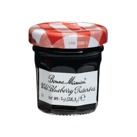 Glass jar of Wild Blueberry Preserves from the Bonne Maman brand, seen from the front.