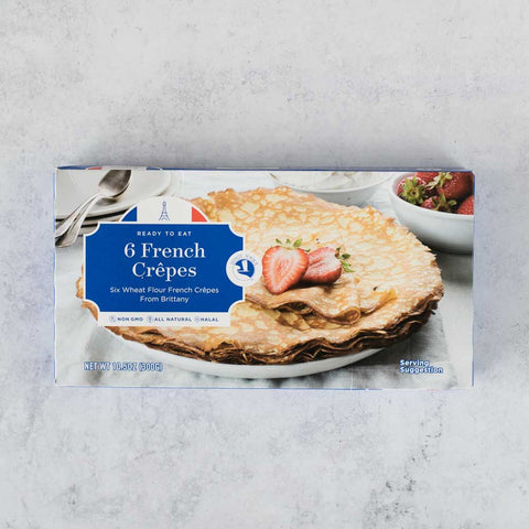 6 French Crepes in their cardboard packaging, placed on marble, seen from above.