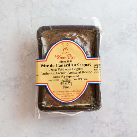 Duck Pate with Cognac wrapped in its plastic from Le Bec Fin brand, seen from above.