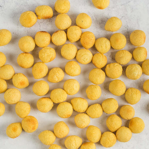 Assortment of Nut Potatoes, laid on marble, front view.
