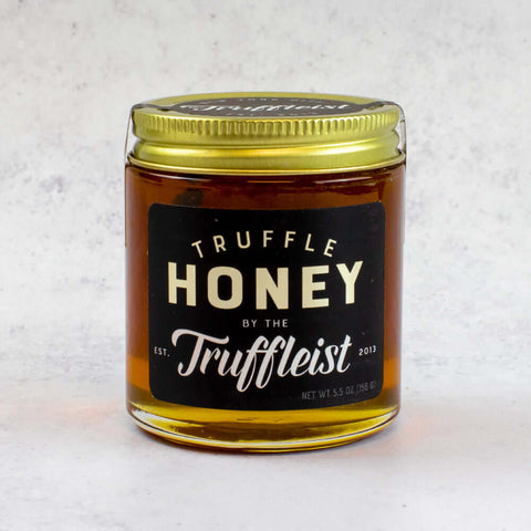 Truffle Honey from Truffleist brand, in a glass jar, front view.