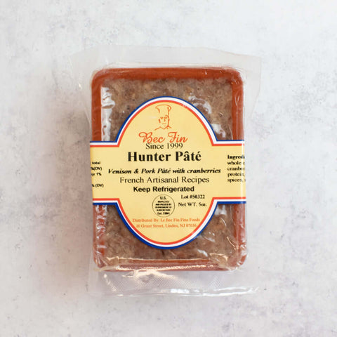 Hunter Venison an Pork Pate w/ Cranberries (Hunter Pate) wrapped in its plastic from Le Bec Fin brand, seen from above.