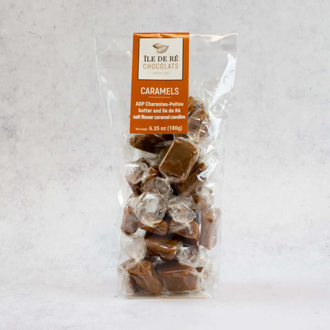 Assortments of Salted Caramel in Bags from the Ile De R?? Chocolats brand, arranged in a plastic bag, front view. 