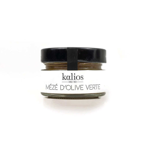 Glass jar containing Mézé D'Olive Verte from Kalios, front view. 