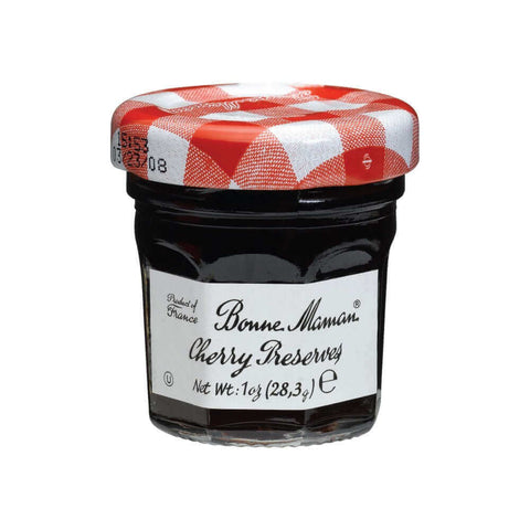 Glass jar of Cherry Preserves from the Bonne Maman brand, front view.