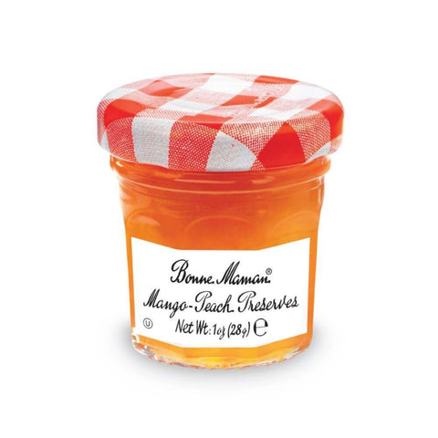 Glass jar of Mango-Peach Preserves from the Bonne Maman brand, seen from the front.
