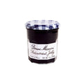 Glass jar of Red Currant Jelly from the Bonne Maman brand, front view.