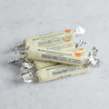 Assortment of 5 La Conviette Mini French Butter Roll, Salted, placed on marble, front view. 