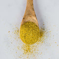 Wooden spoon containing Vicking Salt, seen from above.