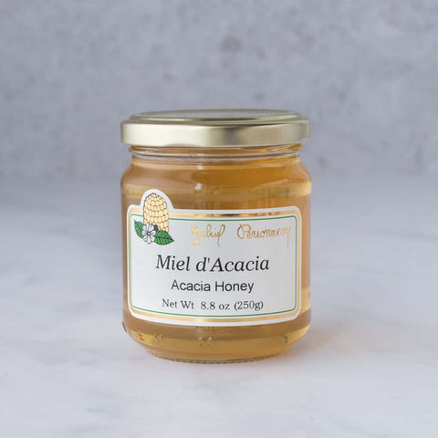 Glass jar of Acacia Honey, front view.