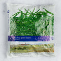 Extra Fine Green Beans assortment in its plastic bag, front view. 