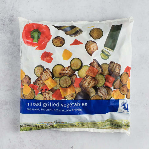 Assorted Mixed Grilled Vegetables in their plastic bags, seen from the front. 