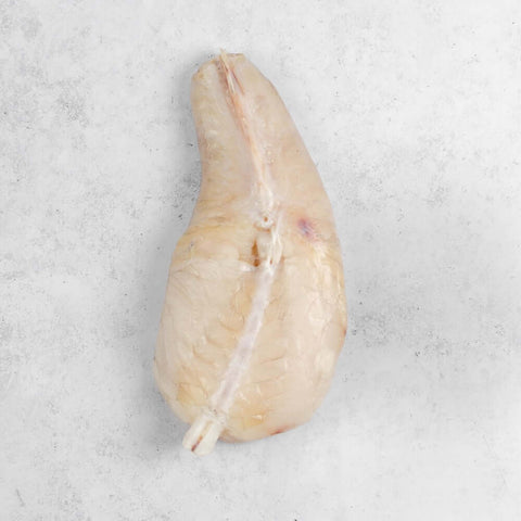 Piece of Wild Monkfish on marble, seen from above. 