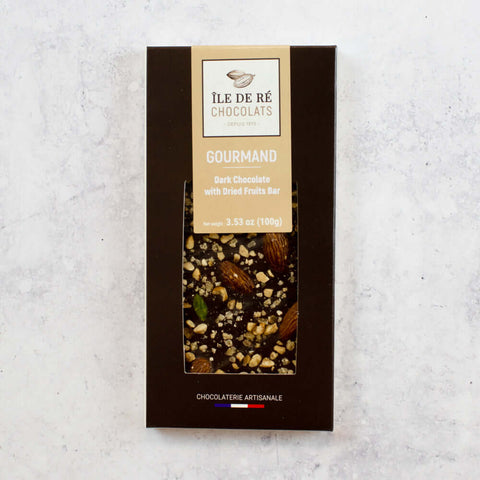 Dark Chocolate with Dried Fruits Bar from the brand Ile De Ré Chocolats, arranged in their box, front view.