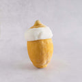 Ripieno Lemon Sorbetto in Fruit Shell on marble, front view.