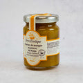 Glass jar of 3.5Oz of mango chutney with Penja pepper from Terre Exotic brand, seen from the side..