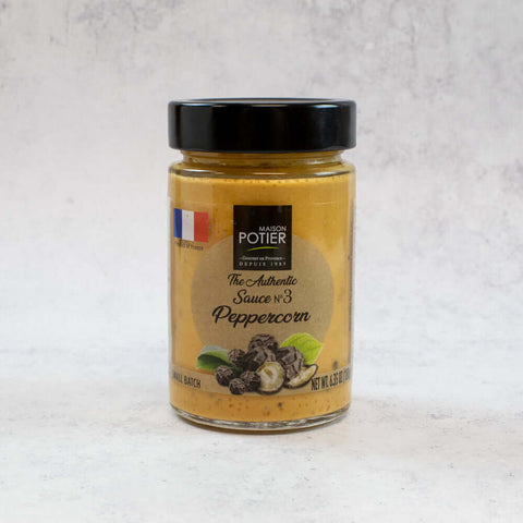 Peppercorn Sauce from Maison Poitier, in a glass jar, front view. 
