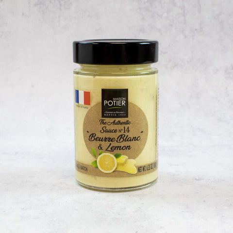 White Butter and Lemon Sauce from Maison Poitier, in a glass jar, front view. 