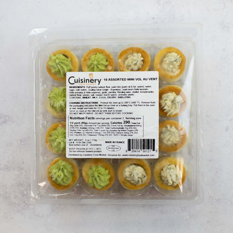 Assortment of 16 Mini Vol Au Vent in their plastic box, seen from above.